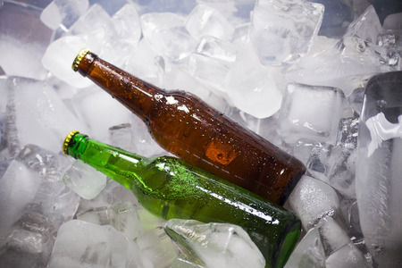 Bottles of beer on iceの写真素材