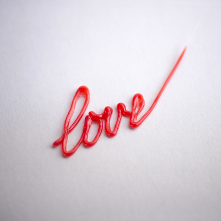 red the writing love drawn by 3d penの写真素材