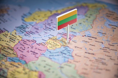 Latvia marked with a flag on the mapのeditorial素材