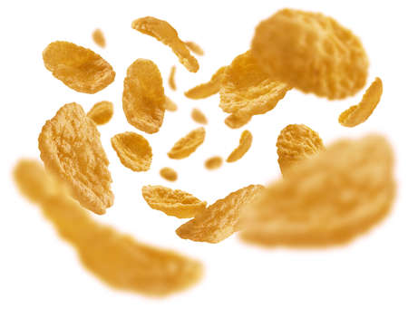 Corn flakes levitate on a white background