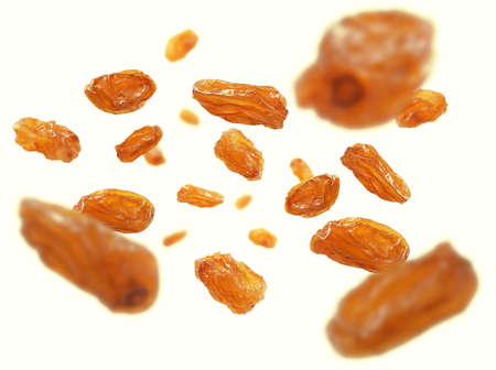 Light grapes levitate on a white background