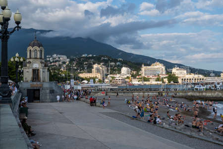 Central embankment, chapel, beach and view of the city of Yalta in the Republic of Crimea, Russia. On the evening of September 7, 2020のeditorial素材