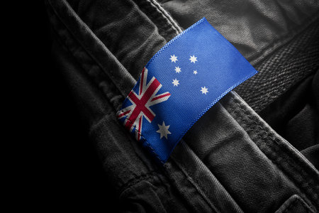 Tag on dark clothing in the form of the flag of the Australiaの写真素材