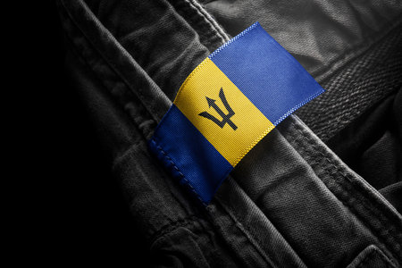 Tag on dark clothing in the form of the flag of the Barbados