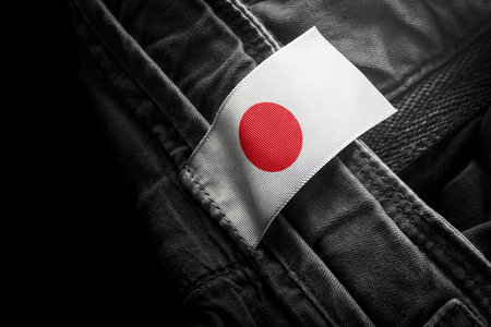 Tag on dark clothing in the form of the flag of the Japanの写真素材