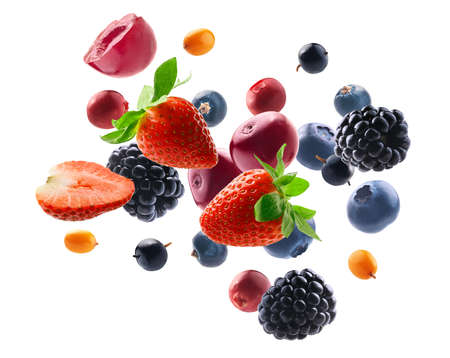Many different berries in the form of a frame on a white backgroundの写真素材
