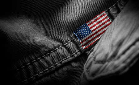 Tag on dark clothing in the form of the flag of the United States of Americaの写真素材