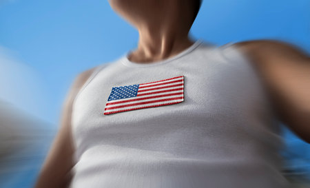 The national flag of United States of America on the athletes chestの写真素材