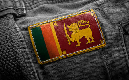 Tag on dark clothing in the form of the flag of the Sri Lankaの写真素材