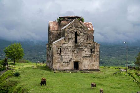 An ancient Bedian temple in the mountains of the Republic of Abkhazia. Cloudy day May 19, 2021のeditorial素材