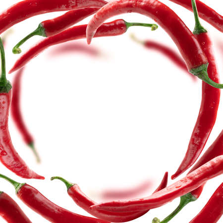 Red hot pepper levitates on a white backgroundの写真素材