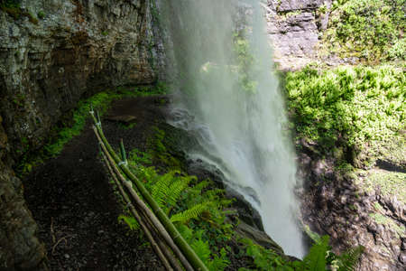 The Giant Waterfall in the Republic of Abkhazia. A clear sunny day on May 20, 2021の写真素材