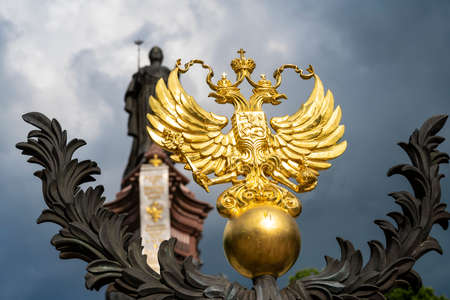 Coat of Arms of Russia on the background of the monument to Empress Catherine in Krasnodar, Russia. Cloudy Day May 23, 2021のeditorial素材