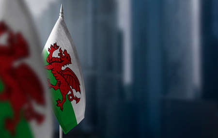 Small flags of Wales on a blurry background of the cityの写真素材