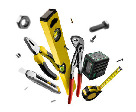 Construction tools levitate on a white background