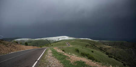 The road through the mountains of the North Caucasus in Russia in springの写真素材
