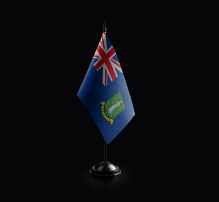 Small national flag of the British Virgin Islands on a black background.の写真素材