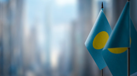 A small Palau flag on an abstract blurry background.の写真素材