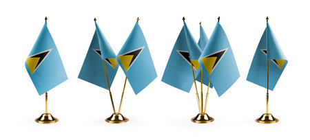 Small national flags of the Saint Lucia on a white background.の写真素材