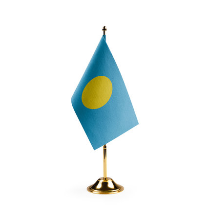 Small national flag of the Palau on a white background.の写真素材