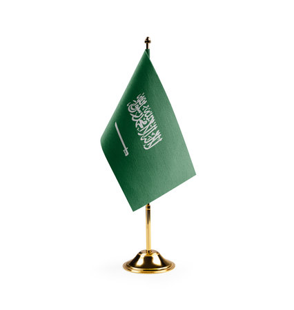 Small national flag of the Saudi Arabia on a white background.の写真素材
