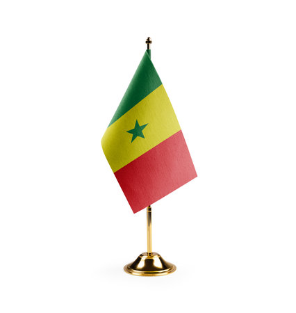 Small national flag of the Senegal on a white background.の写真素材