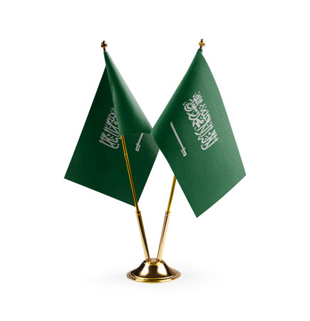 Small national flags of the Saudi Arabia on a white background.の写真素材