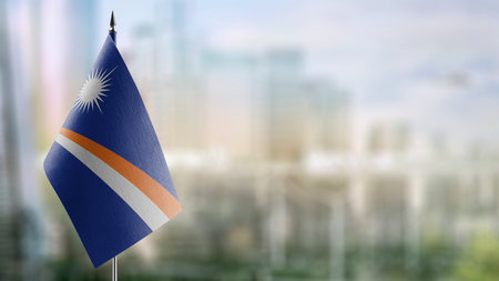 Small flags of the Marshall on an abstract blurry background.の写真素材