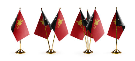 Small national flags of the Papua New Guinea on a white background.の写真素材