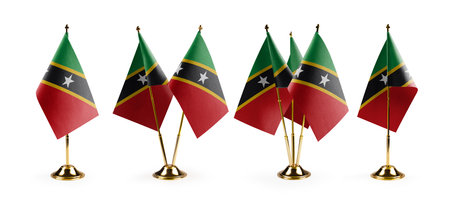 Small national flags of the Saint Kitts and Nevis on a white background.の写真素材