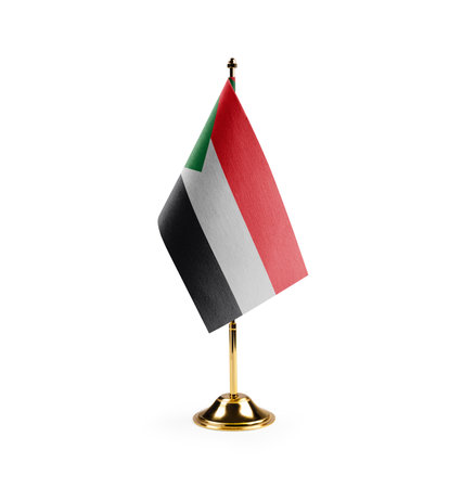 Small national flag of the Sudan on a white background.の写真素材