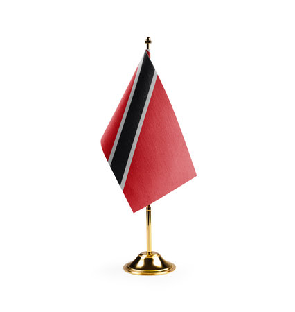 Small national flag of the Trinidad and Tobago on a white background.の写真素材