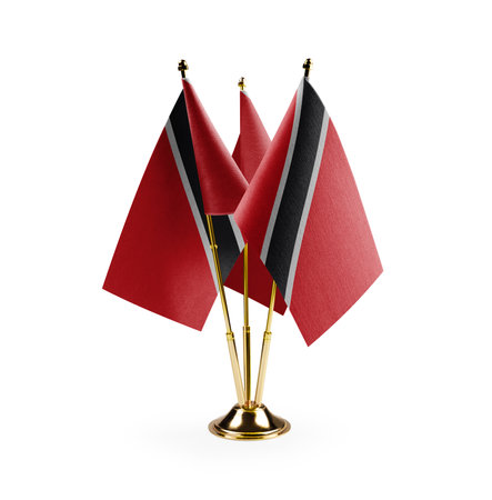 Small national flags of the Trinidad and Tobago on a white background.の写真素材