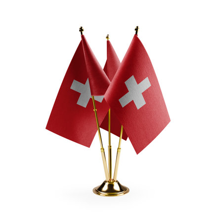 Small national flags of the Switzerland on a white background.の写真素材
