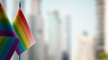 Small flags of the lgbt on an abstract blurry background.の写真素材