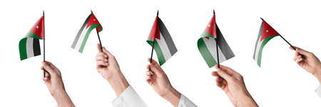 The Jordan flag in hand in different angles on a white backgroundの写真素材