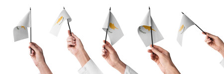 The Cyprus flag in hand in different angles on a white backgroundの写真素材
