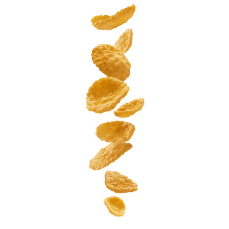 Corn flakes levitate on a white background