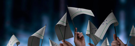 Mercosur flags in their hands on a blurred urban background