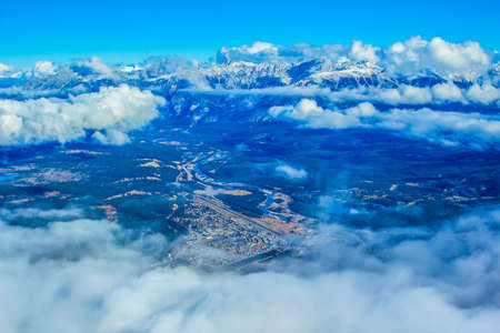 Town of Jasper through the clouds, Jasper National Park, Alberta, Canadaの写真素材