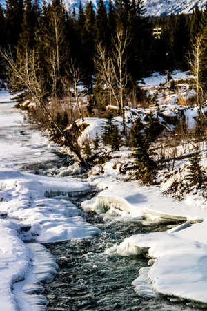 Early thaw on the creek, Deer Creek Provincial Recreation Areaの写真素材