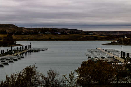 Gloomy snow laden skies get ready to put the finishing touches on summer over diefenbaker lake