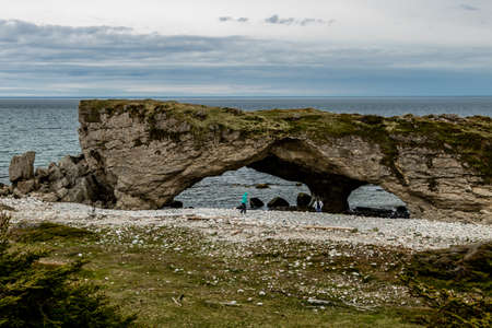 Water carves sea arches, Arches Provincial Park, Newfoundland, Canadaの写真素材
