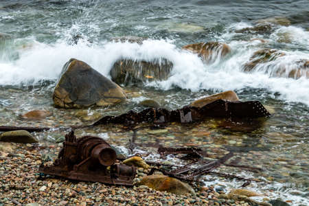 Wreckage of the SS Ethir stewn on the beach during rough seas, Gros Morne National Park, Newfoundland, Canadaの写真素材