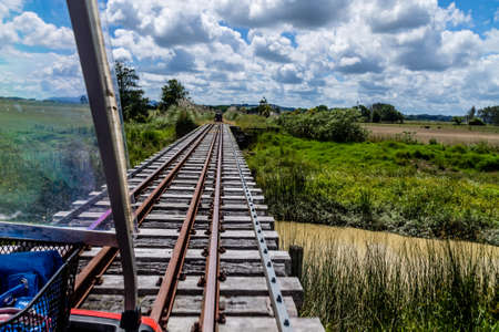ranches, wide open spaces, lush fields and a small railway as well as river runs through it...