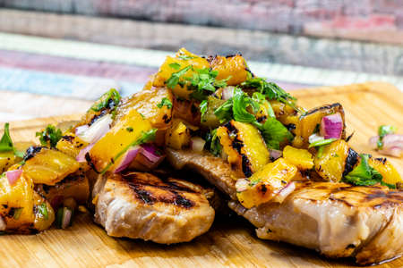 Marinated pork chops with grilled pineapple salsa. Calgary, Alberta, Canadaの写真素材