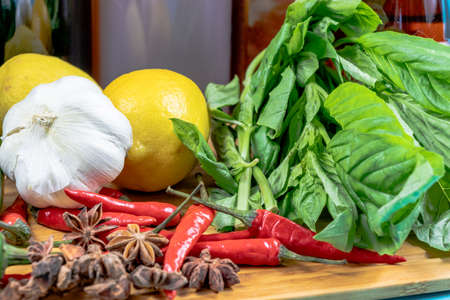 Assorted pantry ingredients on display on a wooden cutting board. Calgary, alberta, Canadaの写真素材