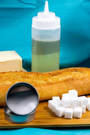 assorted items to be used in moderation on a wooden cutting board. Calgary, Alberta, Canadaの写真素材