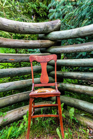 Old chair in a field. Brasgg Creek, Alberta, Canadaの写真素材