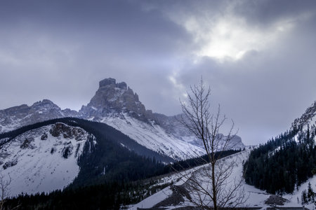 Mountain under snow heavy clouds along the roadside. Yoho National Park, British Columbia, Canadaの写真素材